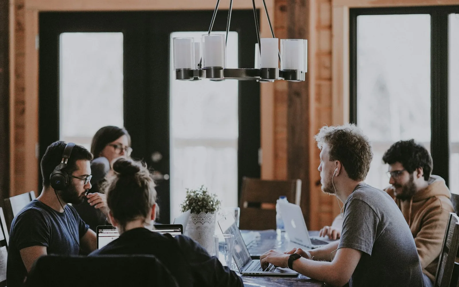 A hiring team reviewing candidate notes and next steps together